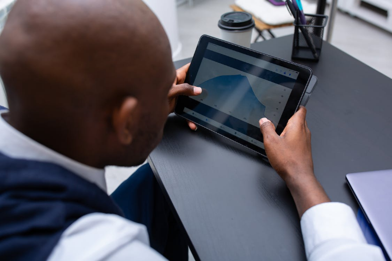 Person checking bandwidth speed on a tablet